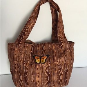 New, never used brown purse with change pouch.